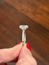 White gold oval lab diamond ring. Center stone is IGI certified and 3.03cts E VVS2