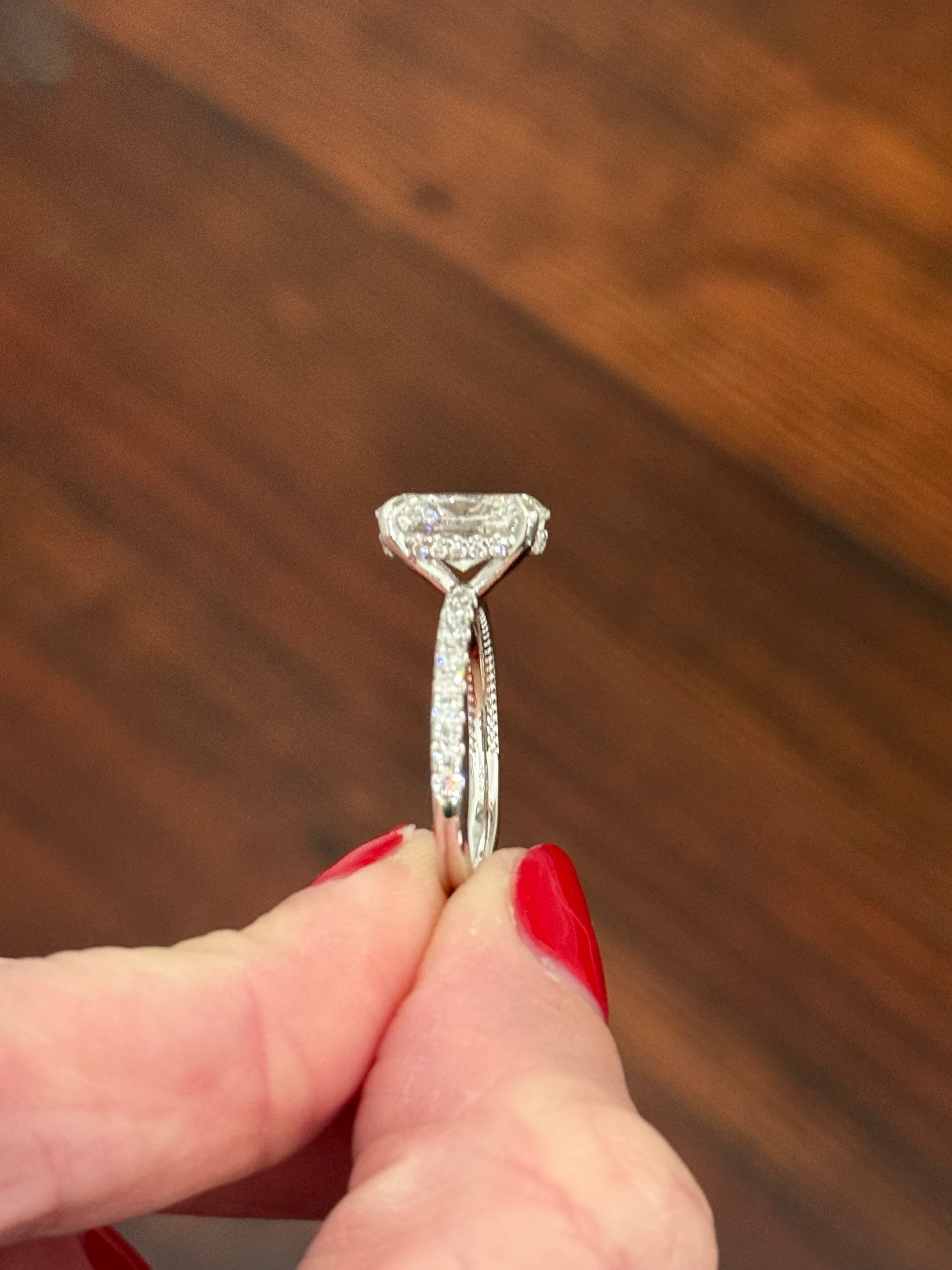 White gold oval lab diamond ring. Center stone is IGI certified and 3.03cts E VVS2