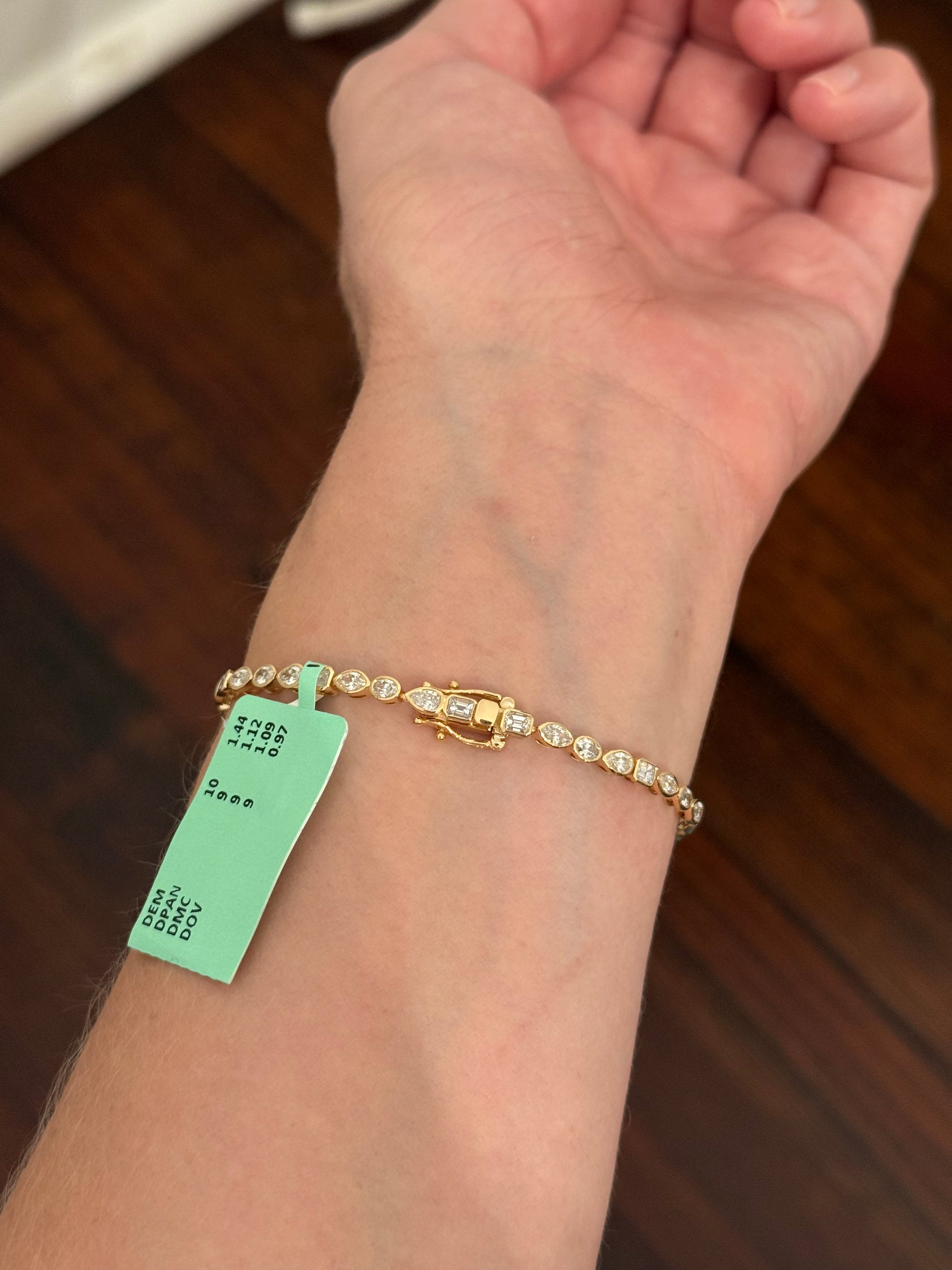 Yellow gold bezel set 4.62cts oval, marquise, pear shape and emerald cut natural diamond bracelet