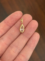 Yellow gold bezel set 1.78ct step cut pear lab diamond pendant