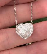 White gold heart shape lab diamond necklace. Center stone is 5.08cts and measures 10.x11.3mm. Chain is 16” with 4” of adjustment to make as long as 20”.