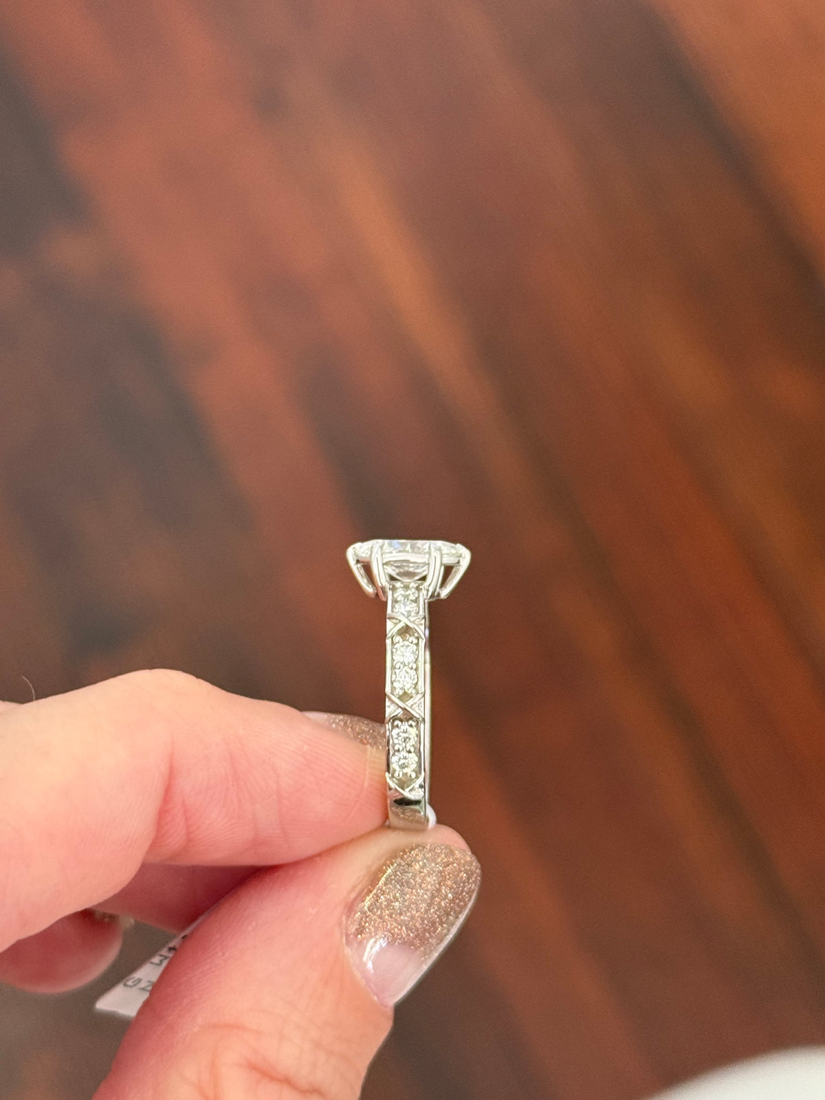 White gold oval and round lab diamond ring. Center stone is 1ct and approximately 8.5x5.5mm
