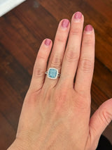 White gold cushion cut blue lab diamond and white lab diamond ring