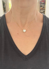 Yellow gold heart shaped lab diamond necklace. Center stone is 3.05cts and measures 8.7x9.6mm. Chain is 16” with 4” of adjustment to make as long as 20”.
