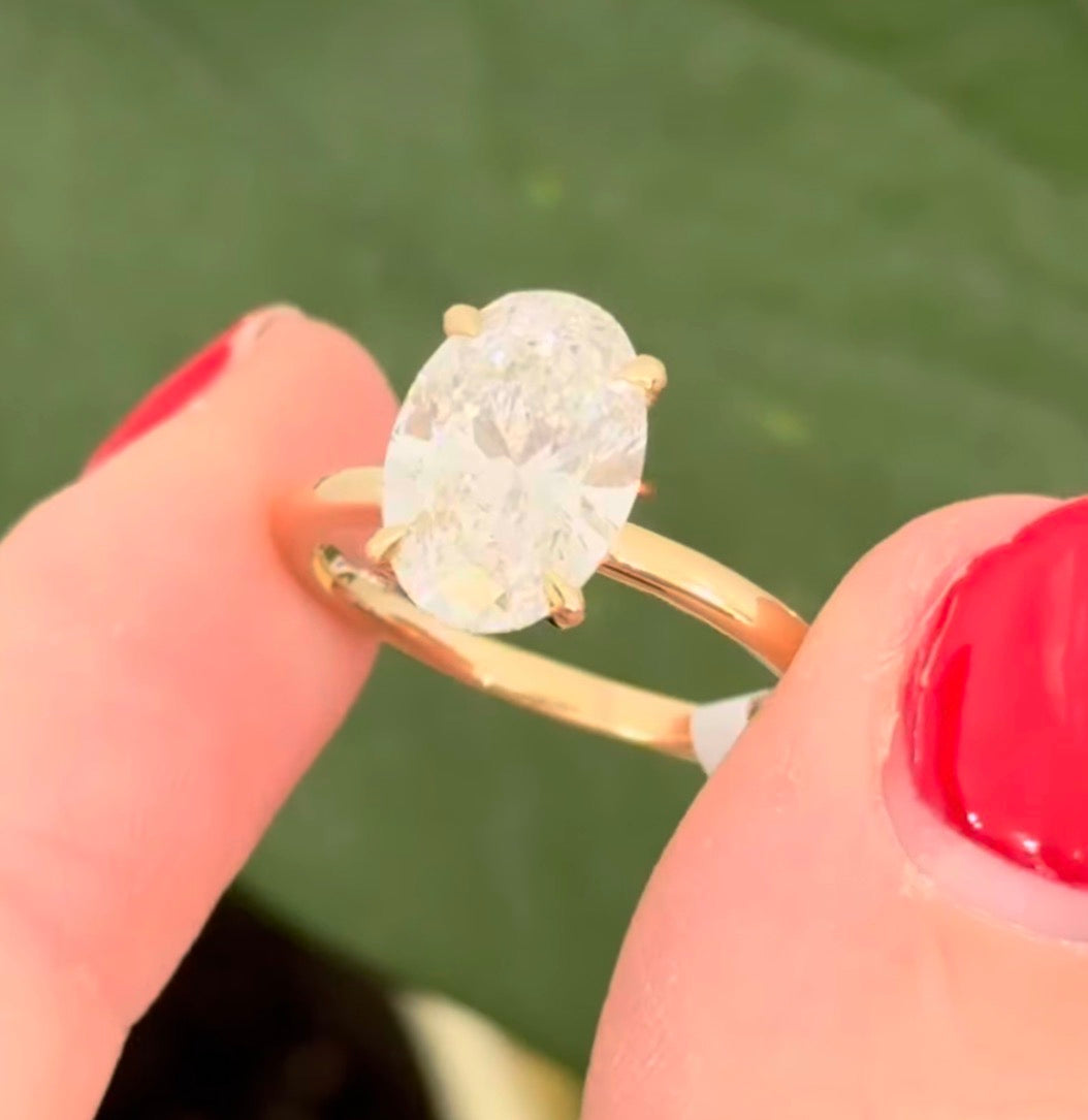 Yellow gold IGI certified oval lab diamond ring