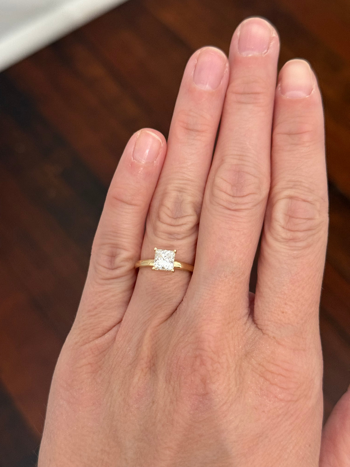 IGI certified princess cut lab diamond ring. Center stone is 1.15cts