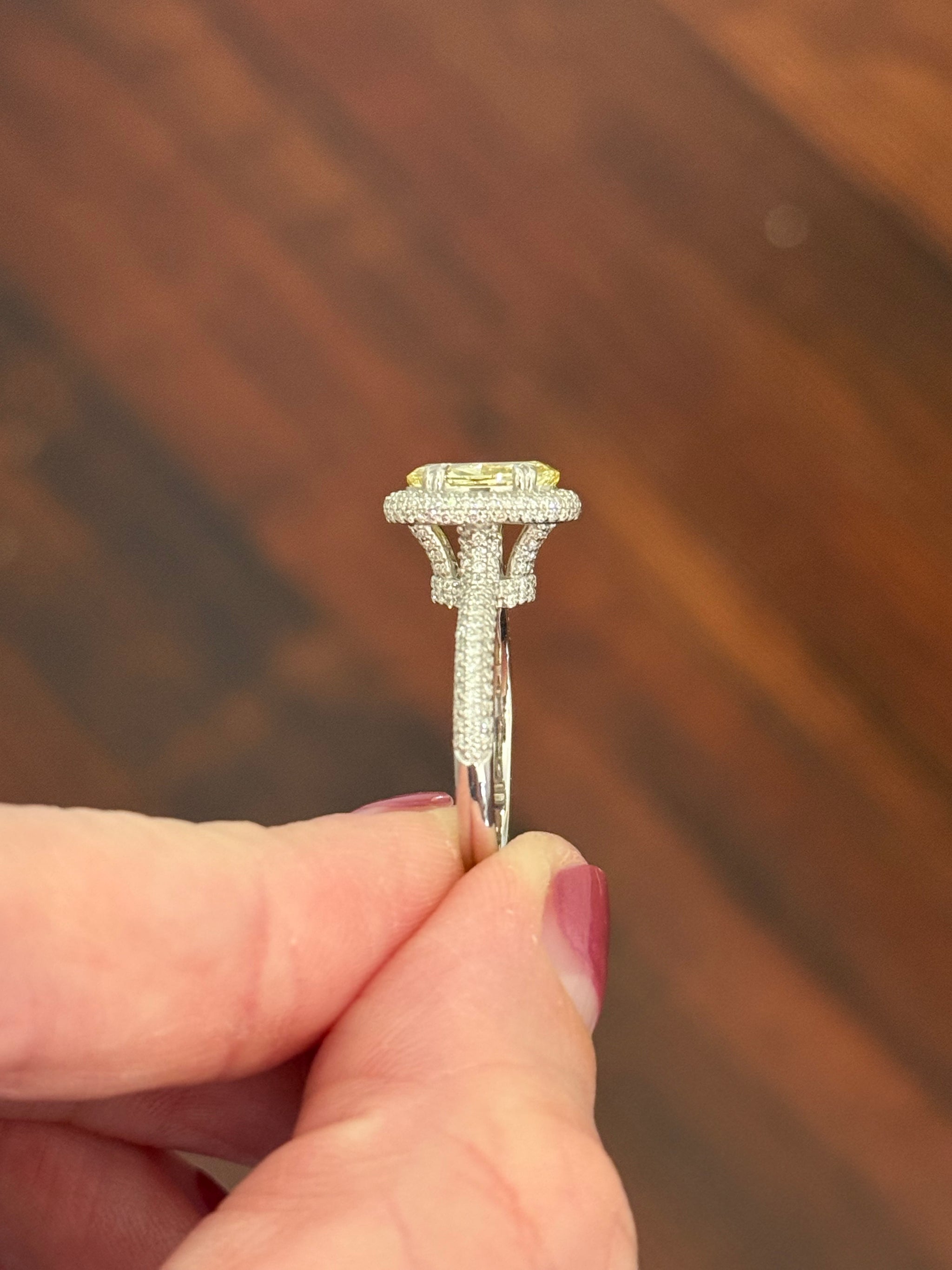 White gold oval lab diamond and white lab diamond ring