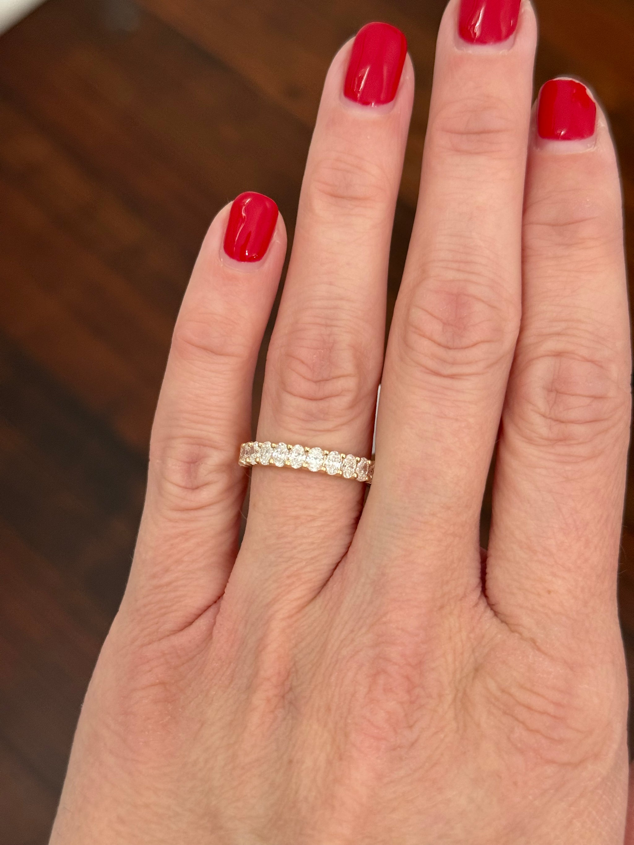 Yellow gold 1.16ct oval lab diamond band