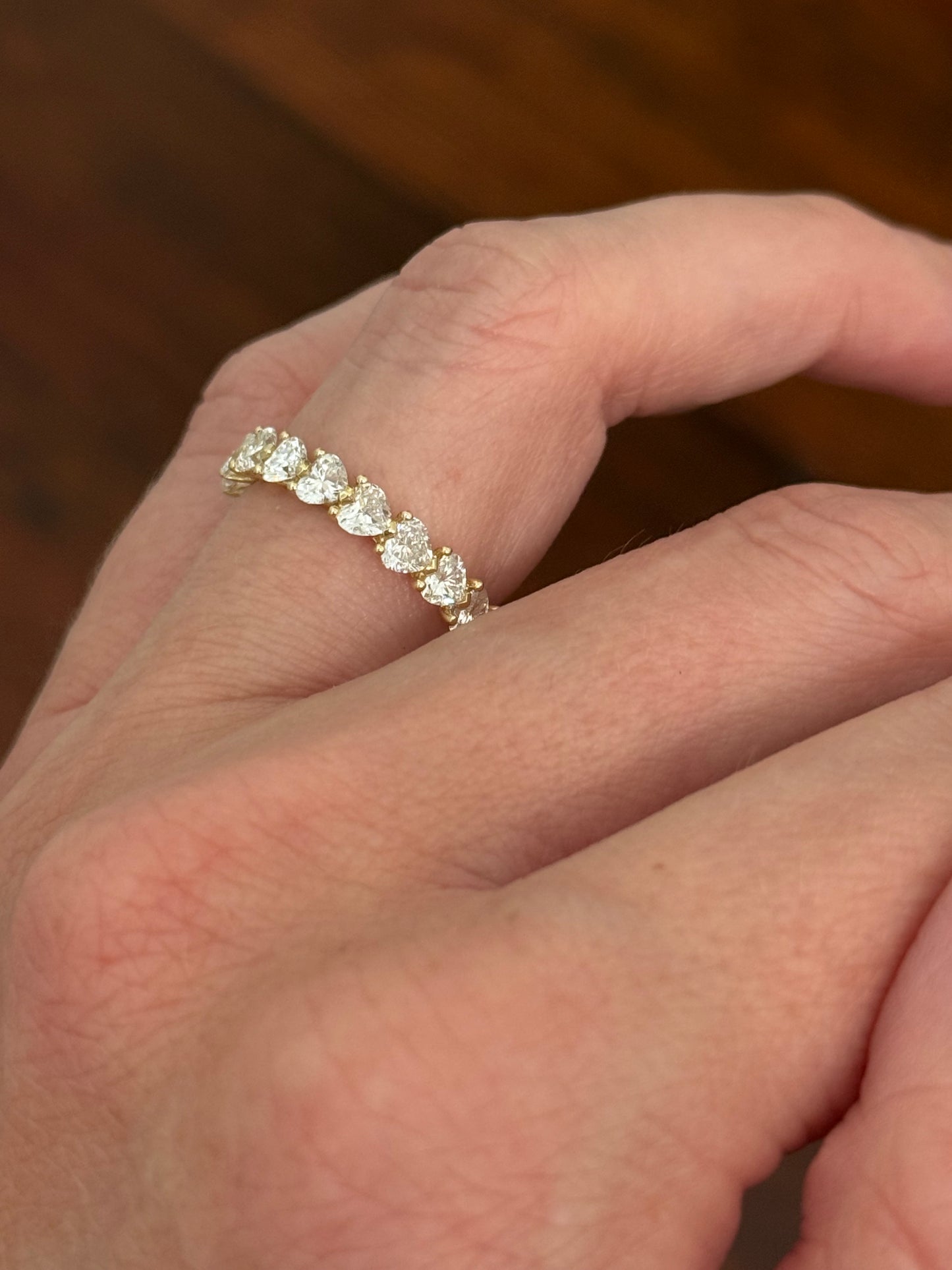 Yellow gold 3.01ct heart shaped lab diamond eternity band