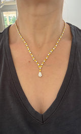White gold pear shape yellow and white lab diamond and round white lab diamond necklace. Center stone is IGI certified and 1.86cts D VVS2