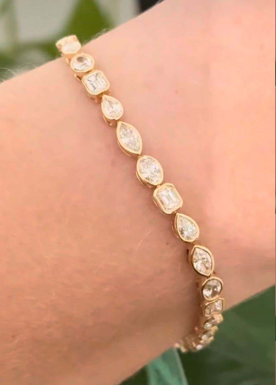 Yellow gold bezel set 5.35ct oval, marquise, pear shape and emerald cut natural diamond bracelet