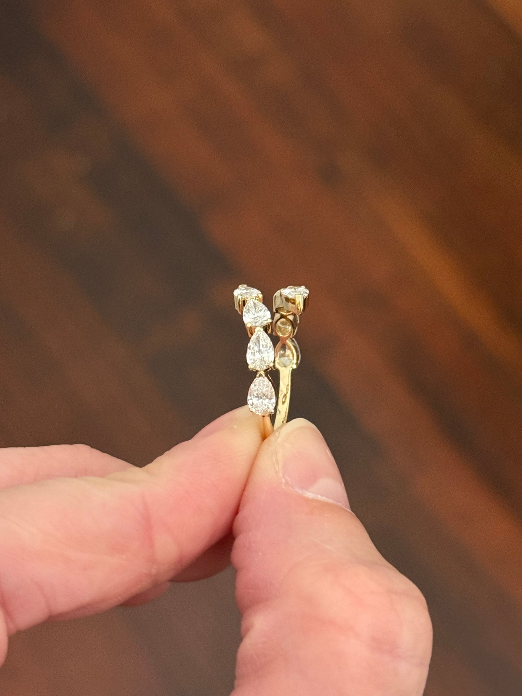 Yellow gold pear shape lab diamond bypass ring