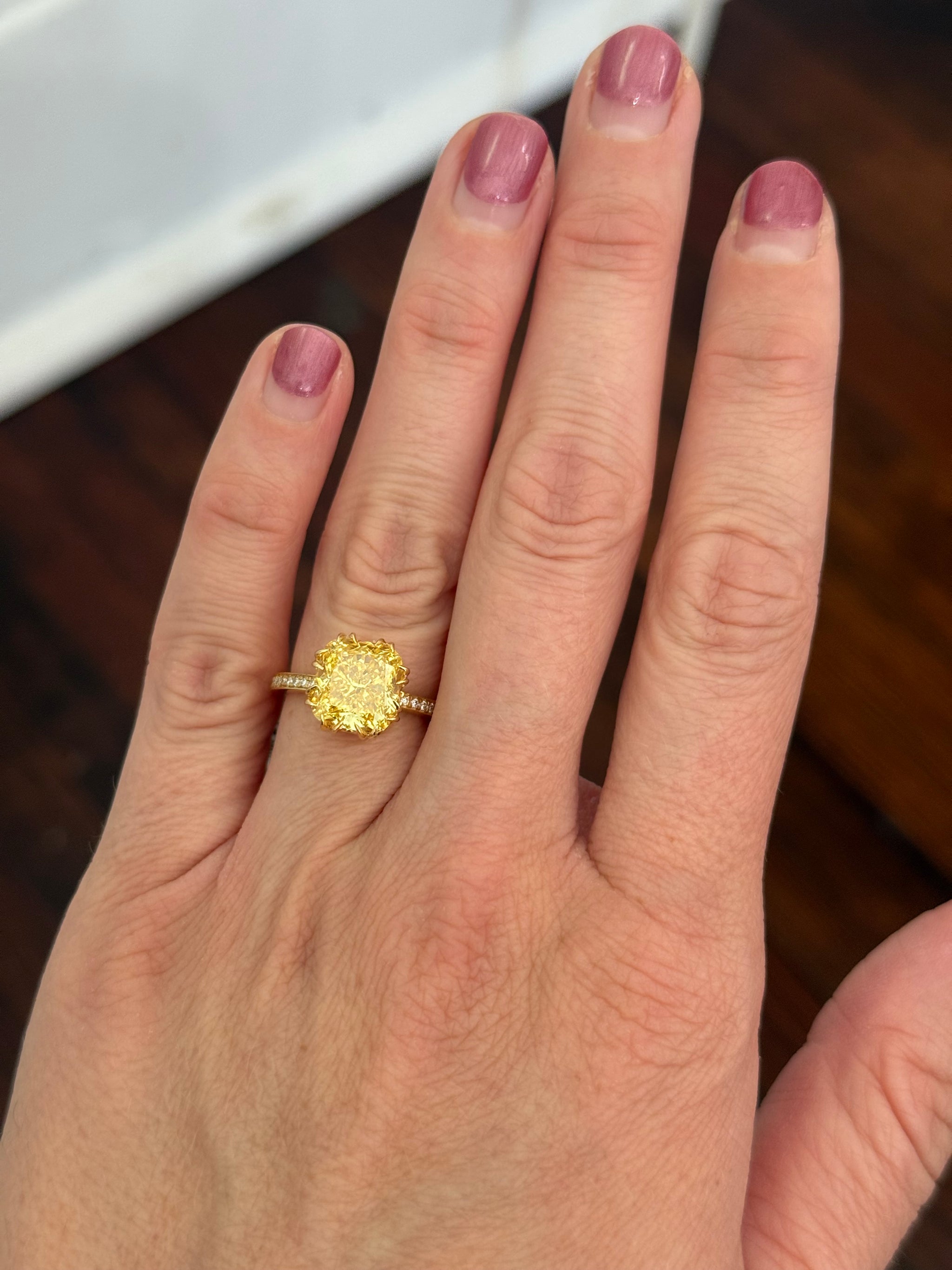 Yellow gold cushion cut yellow lab diamond and white lab diamond ring