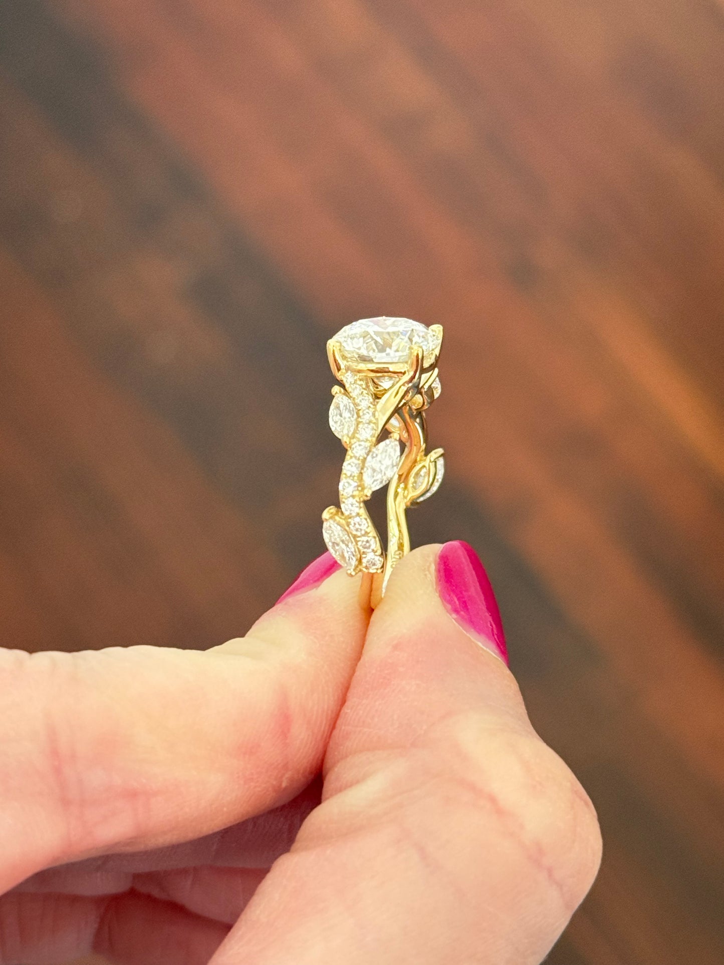 Yellow gold round and marquise lab diamond ring. Center stone is 3.05cts