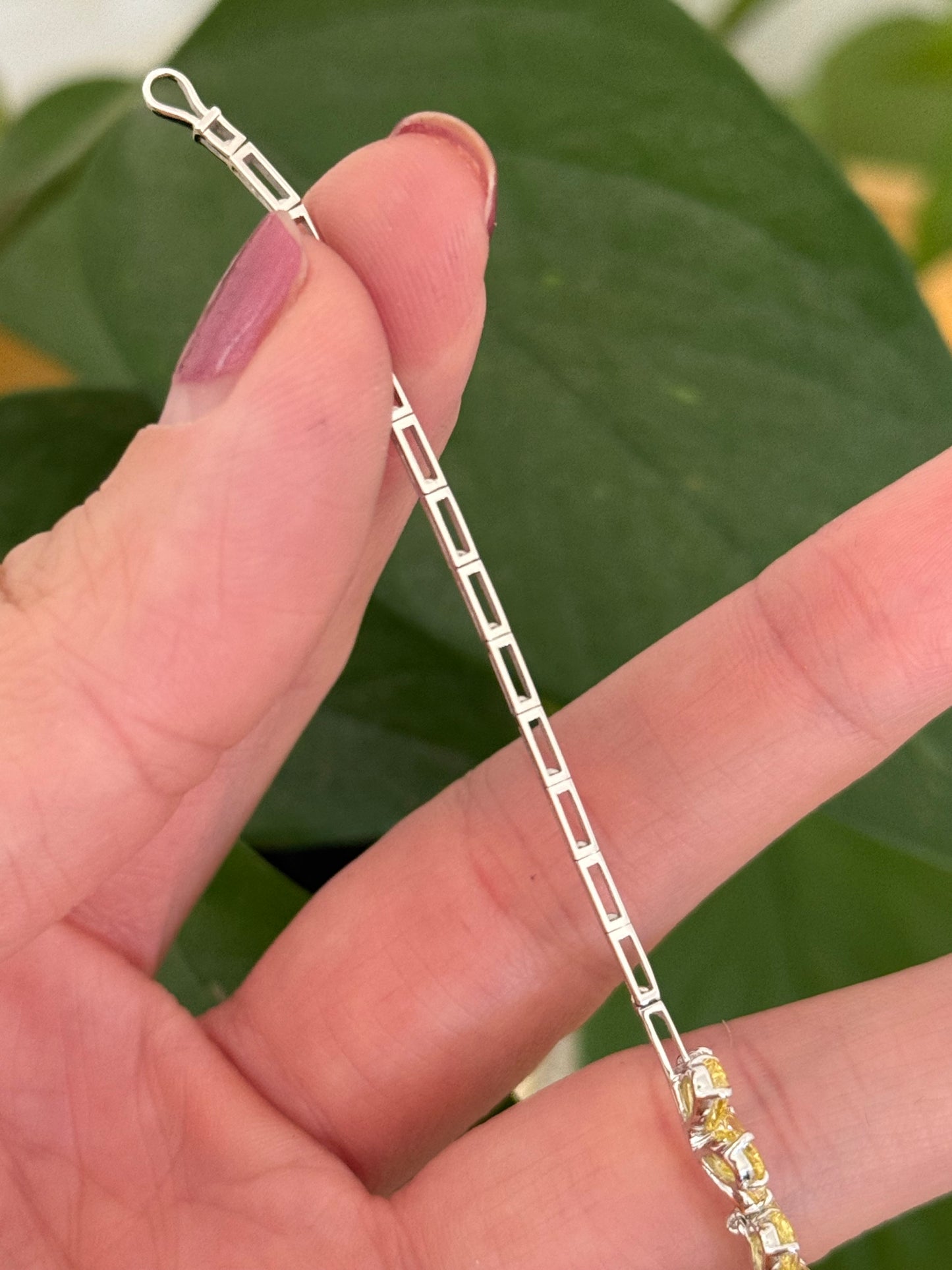 White gold flower bracelet with pear shaped yellow lab diamonds and round white lab diamonds