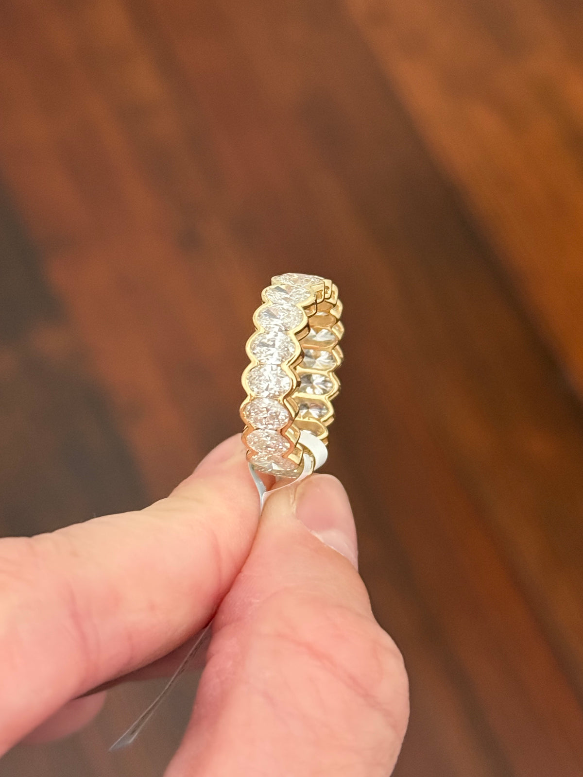 IGI certified 5.14ct oval lab diamond half bezel set eternity band