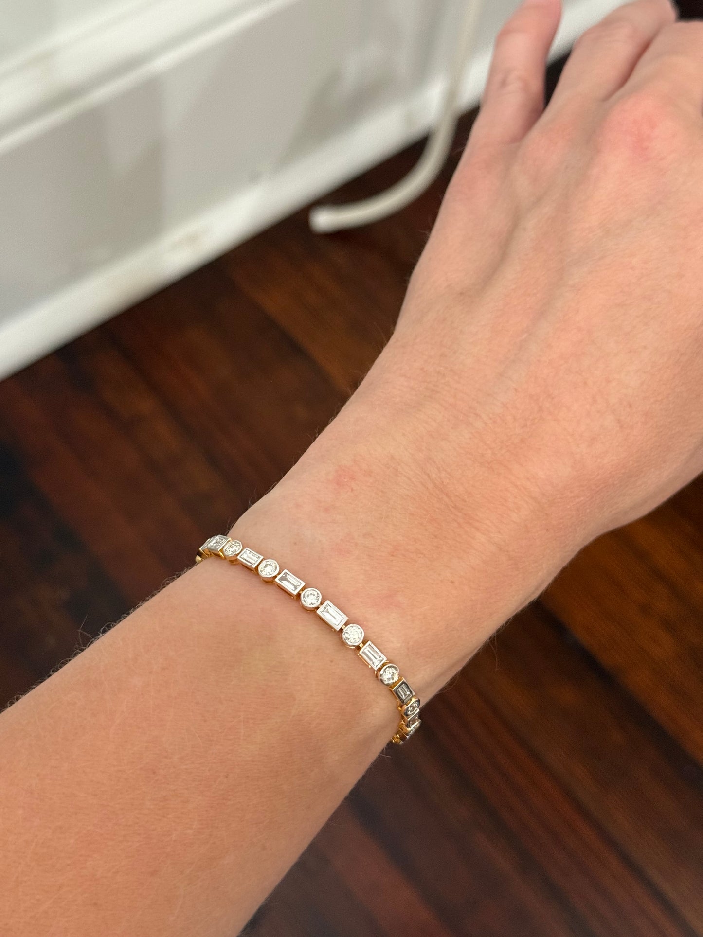 Yellow gold with white gold bezel setting 4.85ct baguette and round natural diamond bracelet
