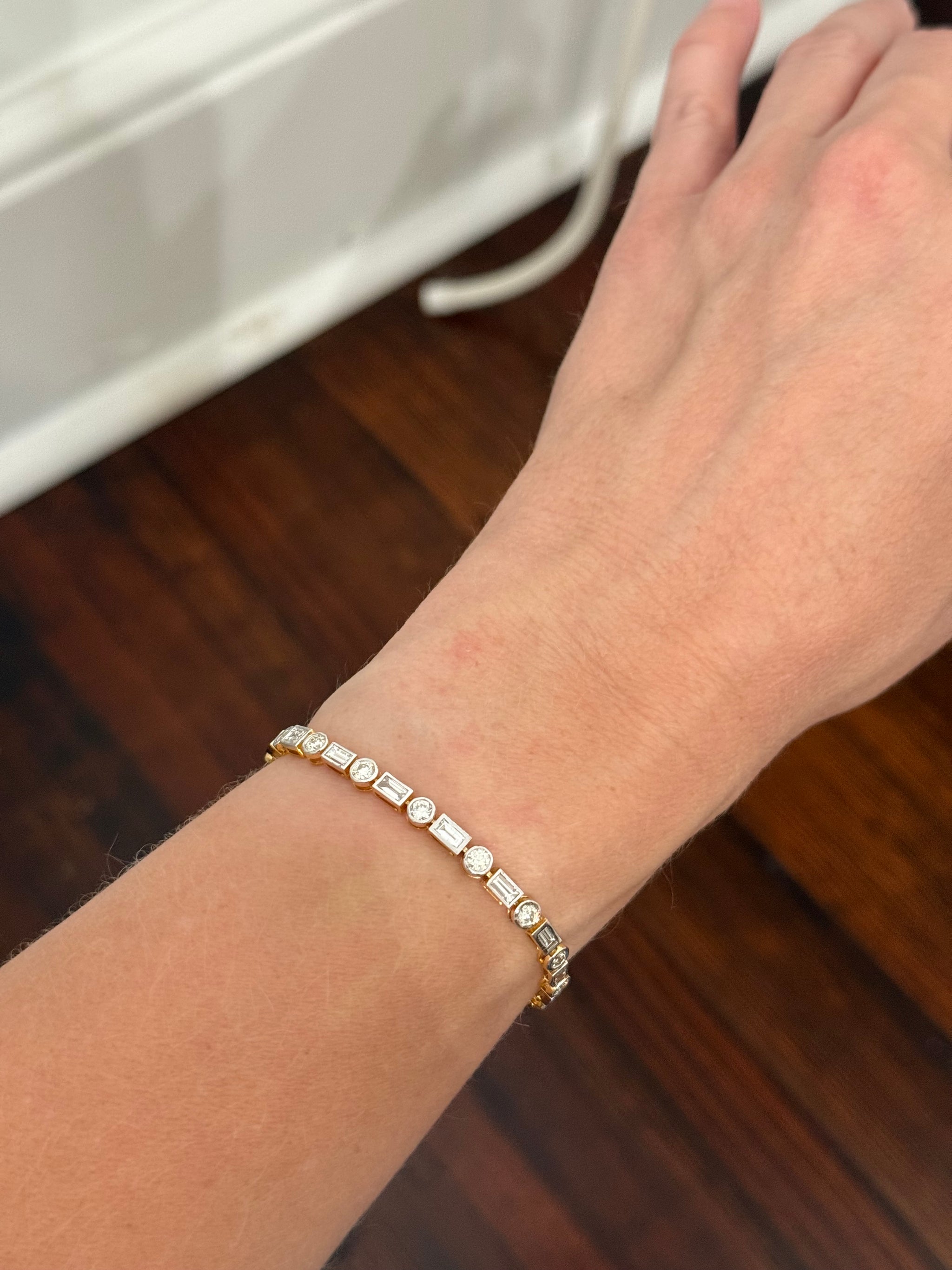 Yellow gold with white gold bezel setting 4.85ct baguette and round natural diamond bracelet
