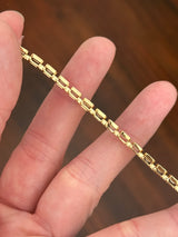 Yellow gold bezel set 5.71ct emerald cut natural diamond bracelet