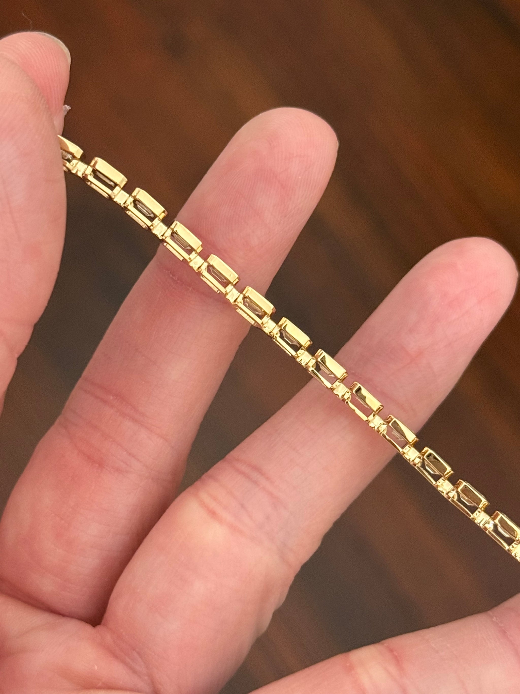 Yellow gold bezel set 5.71ct emerald cut natural diamond bracelet