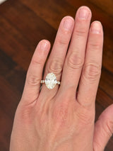 Yellow gold oval and round lab diamond ring and band set. Center stone is 6.58cts