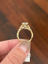 Yellow gold radiant and marquise lab diamond ring. Center stone is 3.07cts E VS1 and measures 9.8x6.7mm