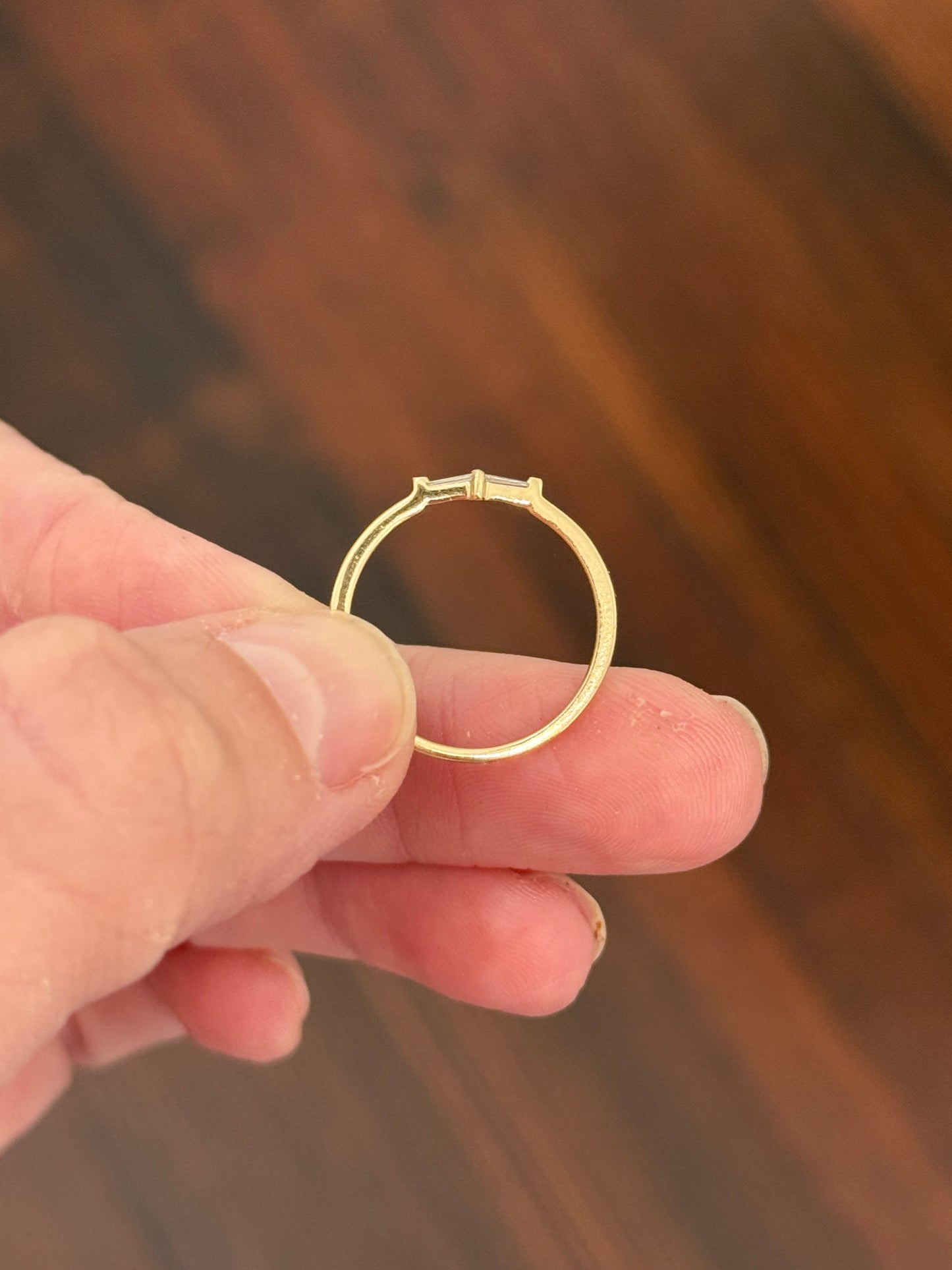 Yellow gold tapered baguette natural diamond band