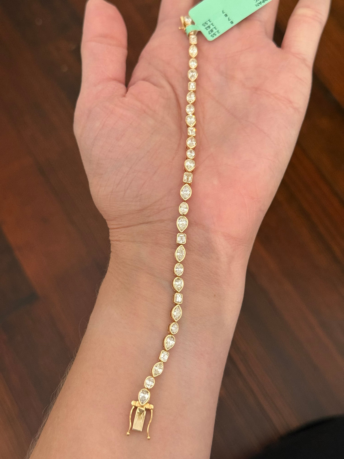 Yellow gold bezel set 7.58ct marquise, oval, emerald cut and pear shape natural diamond bracelet