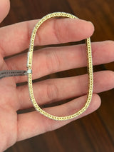 Yellow gold 5.56ct lab diamond bracelet. Prongs are white gold.