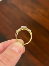 Yellow gold marquise and kite lab diamond ring. Prongs are white gold.