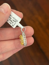 White gold oval yellow lab diamond and white round lab diamond pendant. Yellow lab diamond has yellow gold prongs and is IGI certified 5.11cts fancy vivid yellow VS2