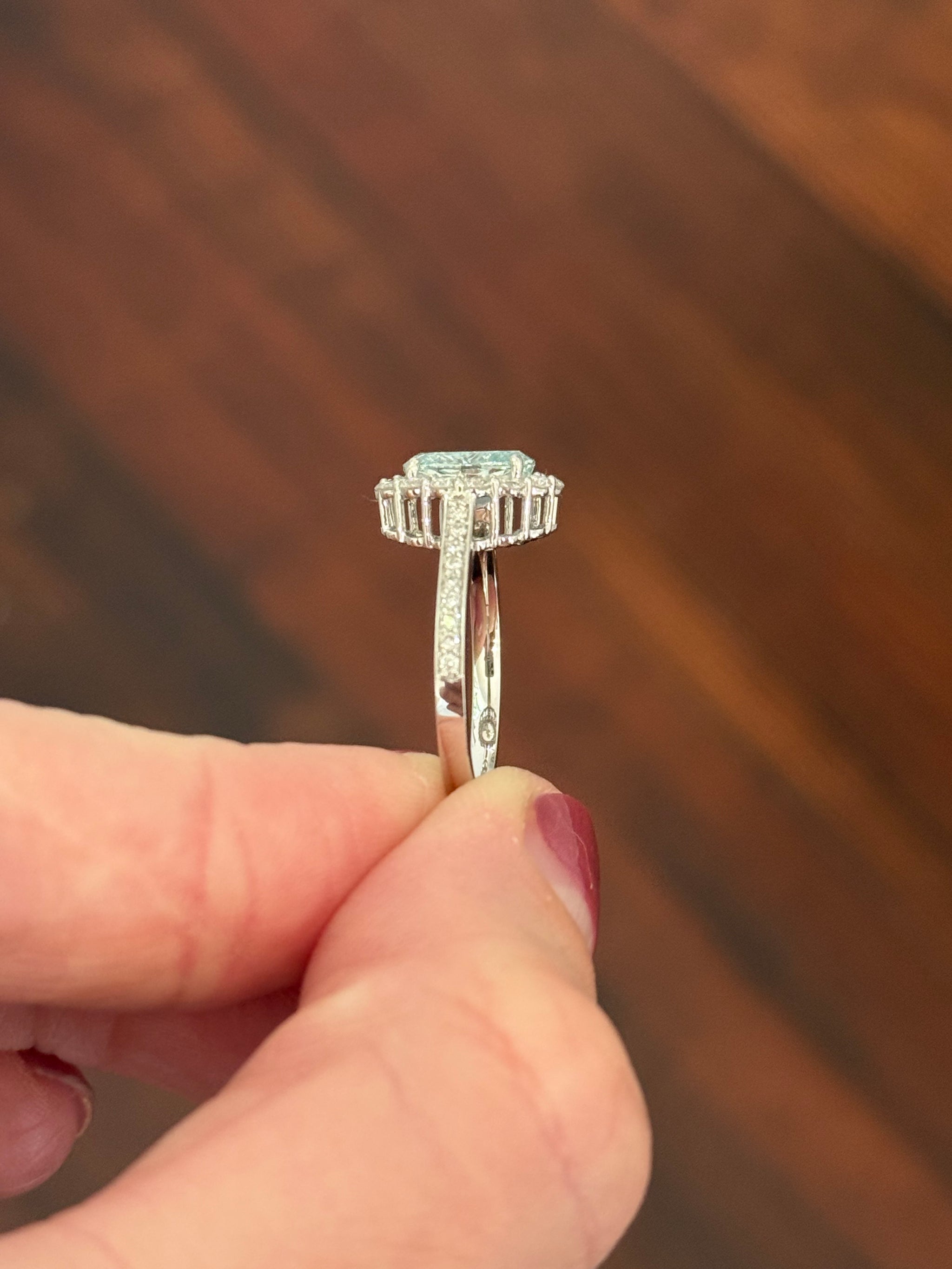 White gold oval blue lab diamond and white lab diamond ring