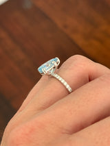 White gold pear shape blue lab diamond and white lab diamond ring