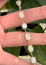 IGI certified Yellow gold mixed shape bracelet with 13.87cts of oval, round, radiant, heart shape, emerald and cushion cut lab diamonds