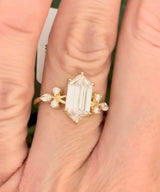 Yellow gold IGI certified 2.69ct step cut duchess cut lab diamond and marquise and round lab diamond ring. Duchess cut measures 12.69x6.28x4.05mm