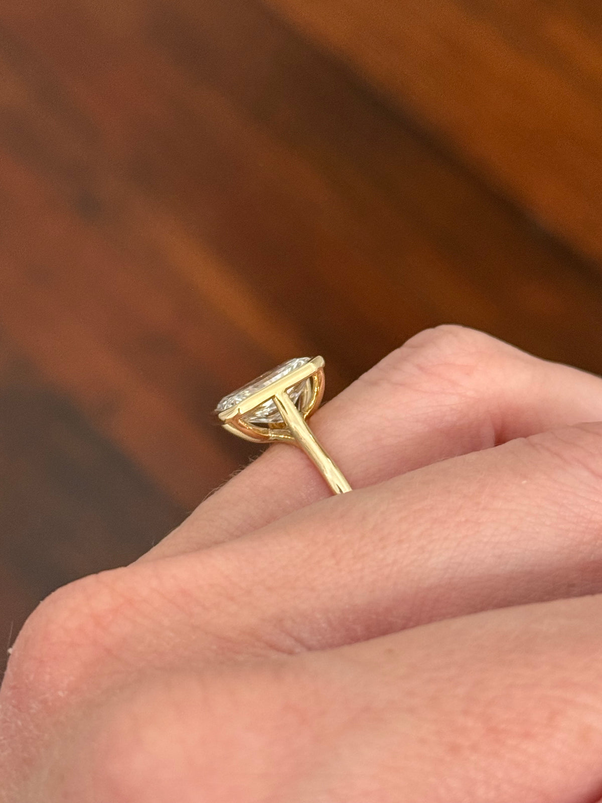 Yellow gold bezel set 3.99ct radiant lab diamond ring