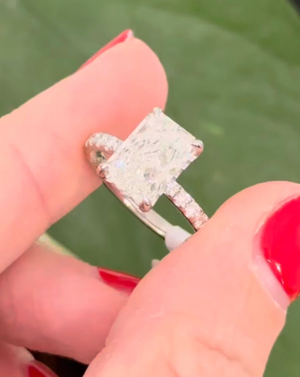 White gold radiant lab diamond ring. Center stone is IGI certified and 3.0cts E VVS2