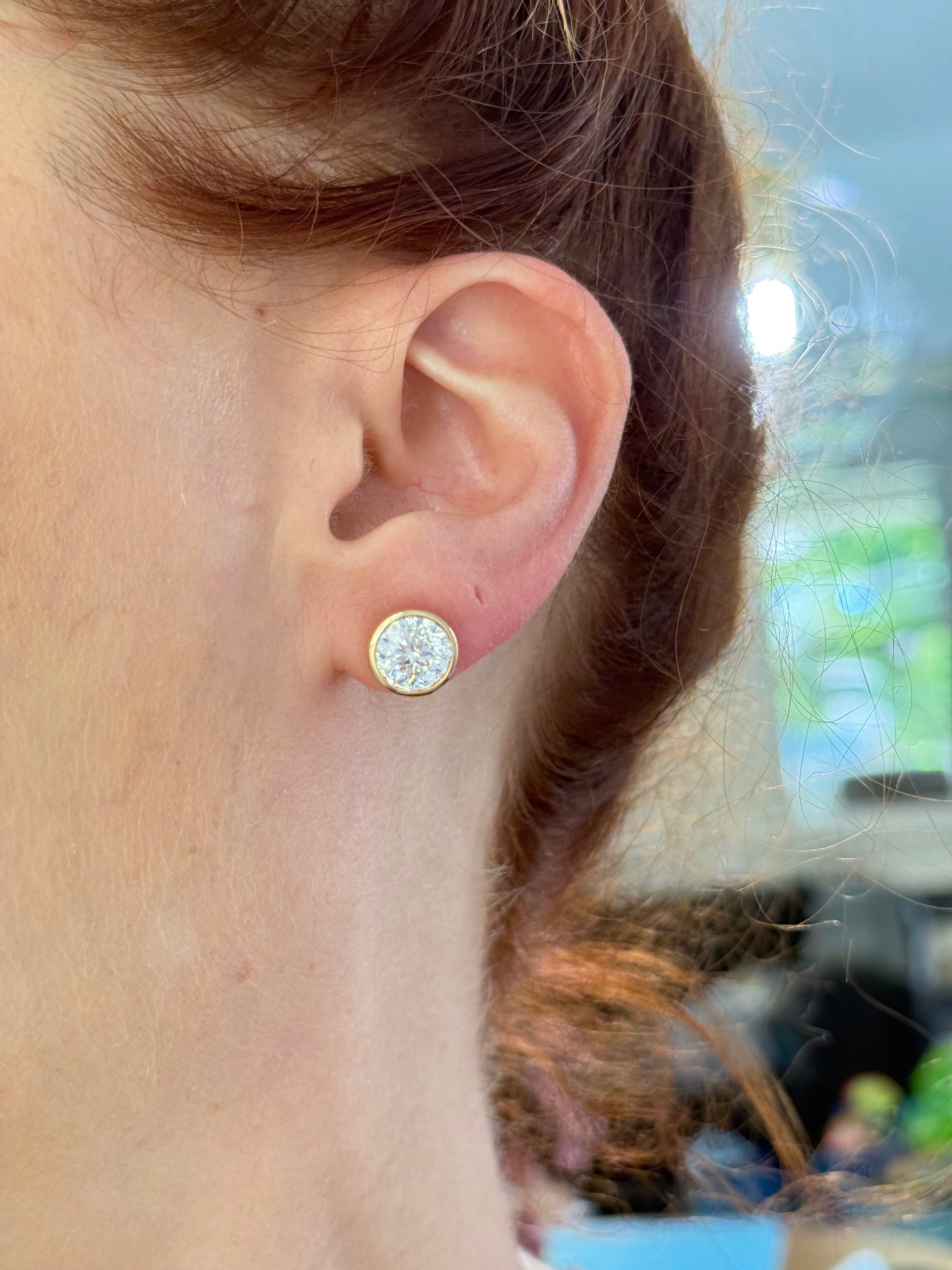 Yellow gold bezel set round lab diamond studs with pushback