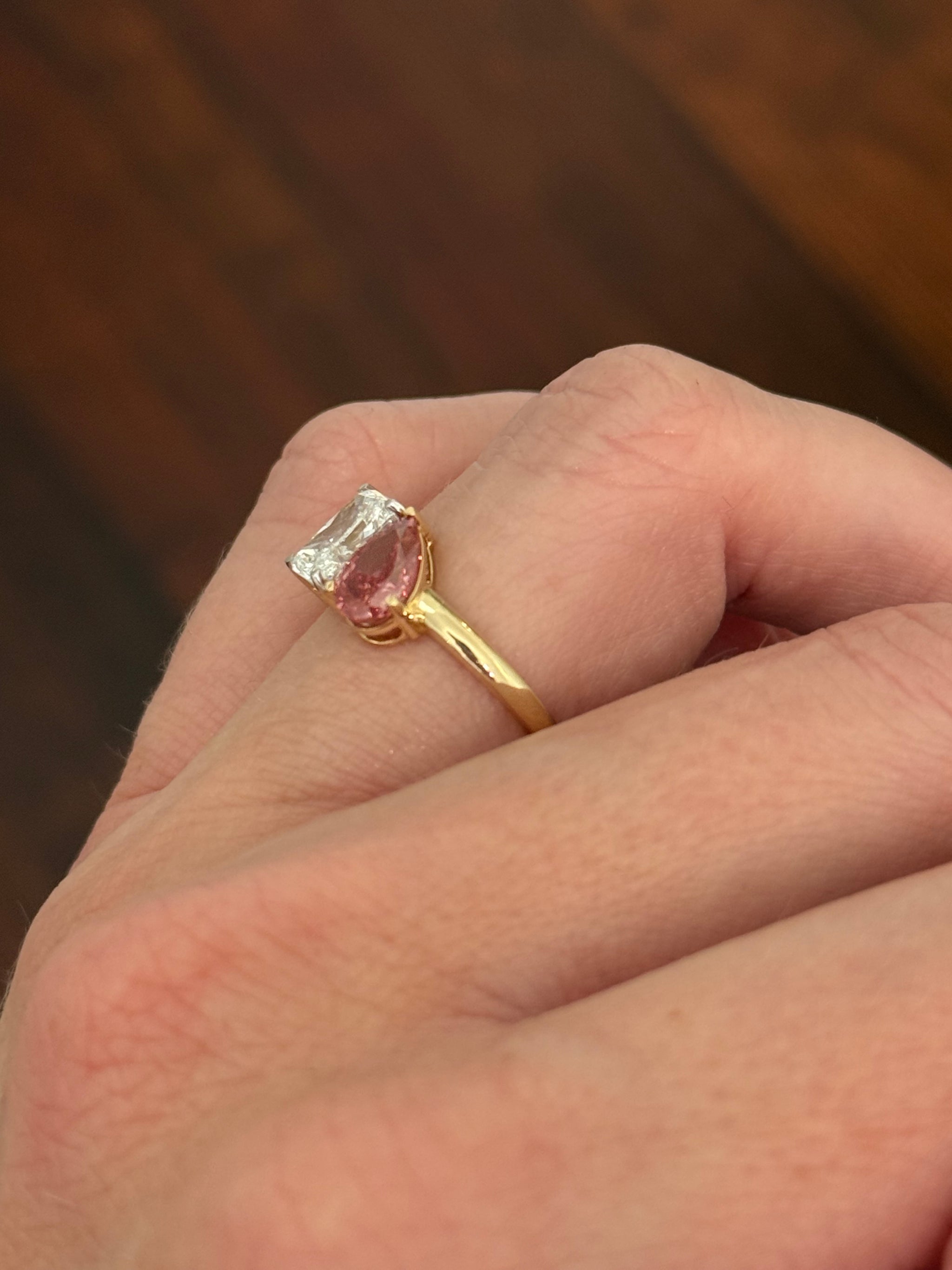 Yellow gold pear shape pink lab diamond and radiant white lab diamond ring