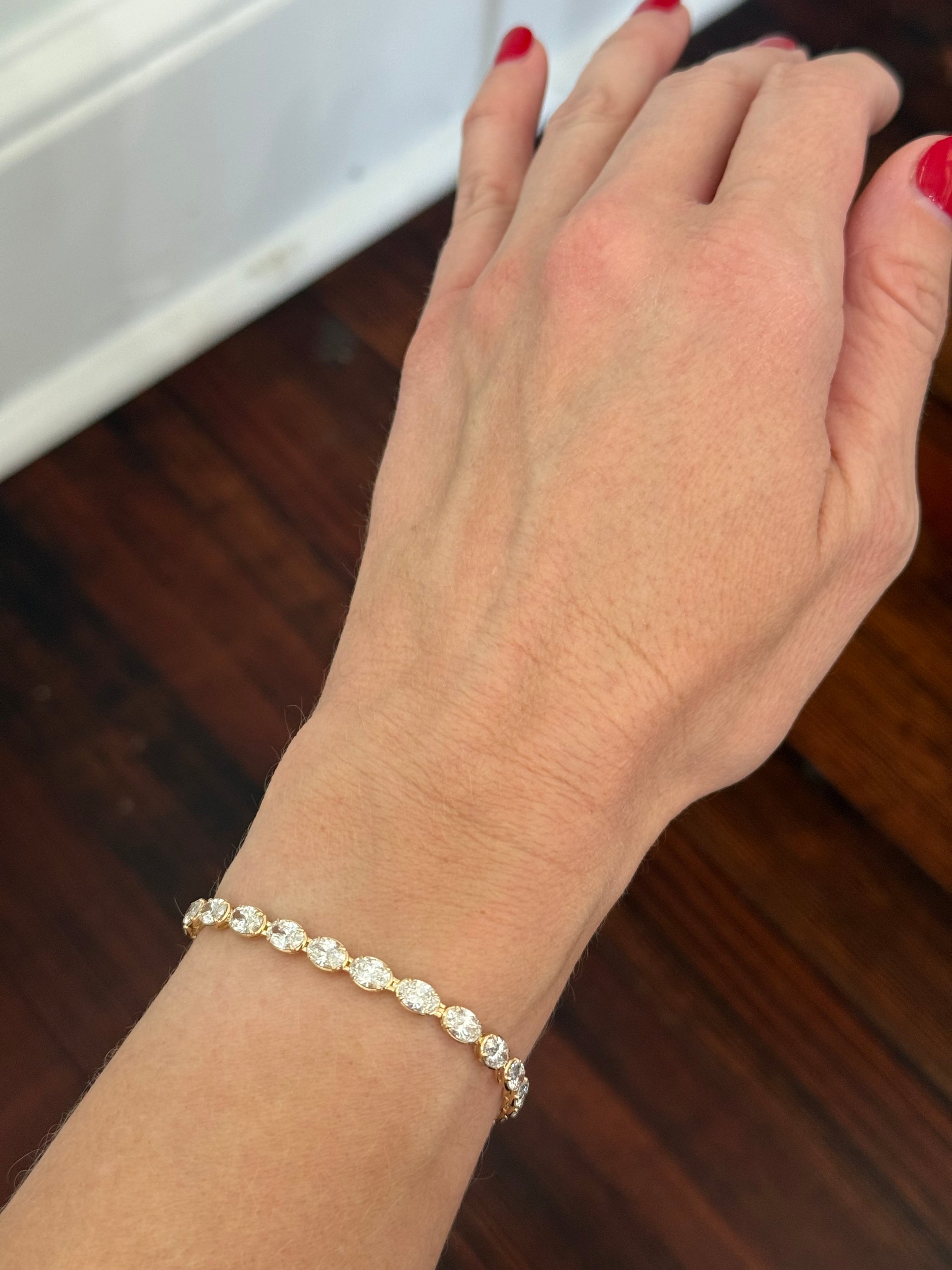 Yellow gold east west set 10.03ct oval lab diamond bracelet