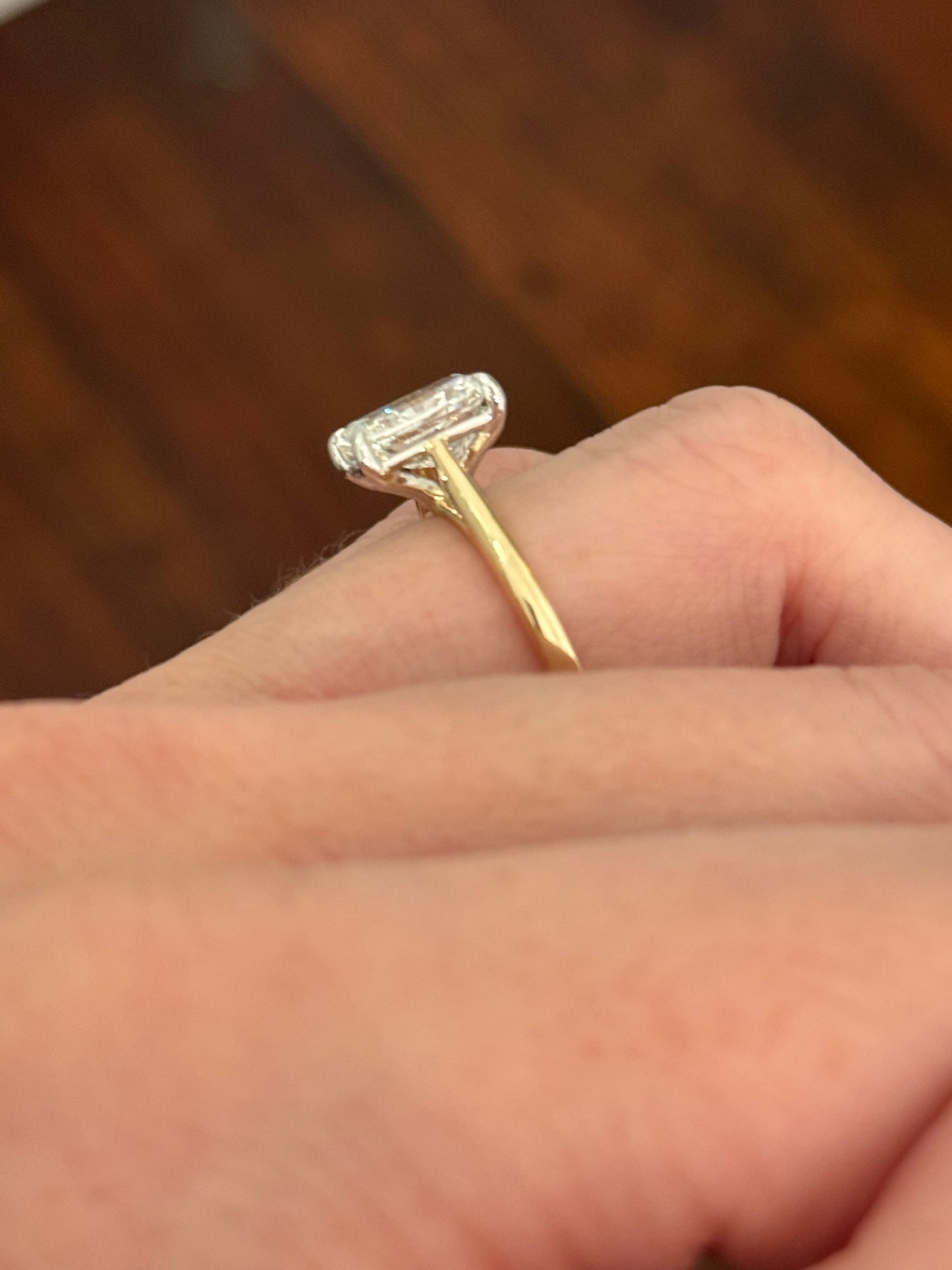 Yellow gold IGI certified radiant lab diamond ring. Lab diamond is set in white gold