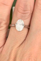 IGI certified oval lab diamond ring. Center stone is 2.03cts
