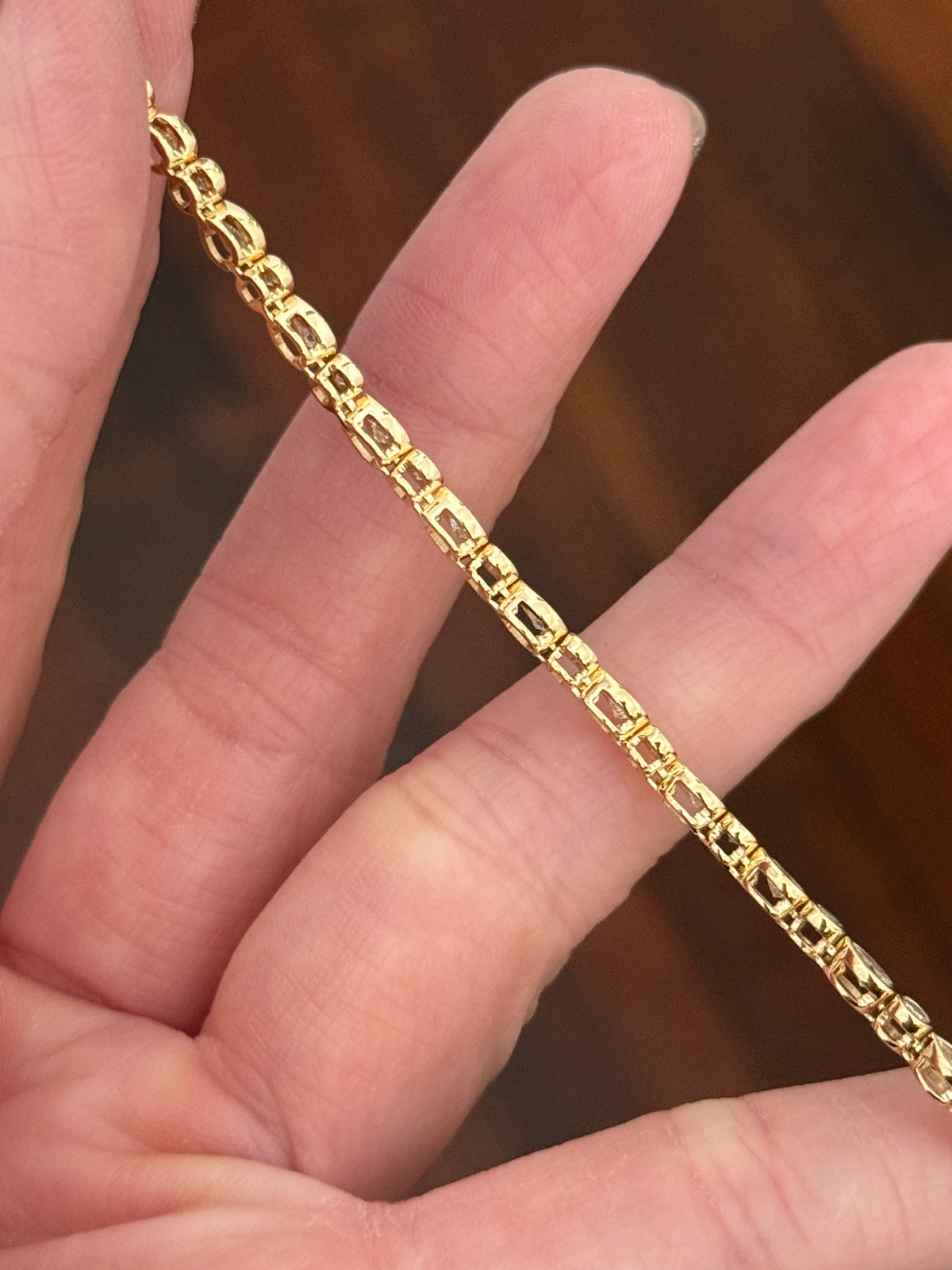 Yellow gold bezel set 3ct pear shape and round natural diamond bracelet