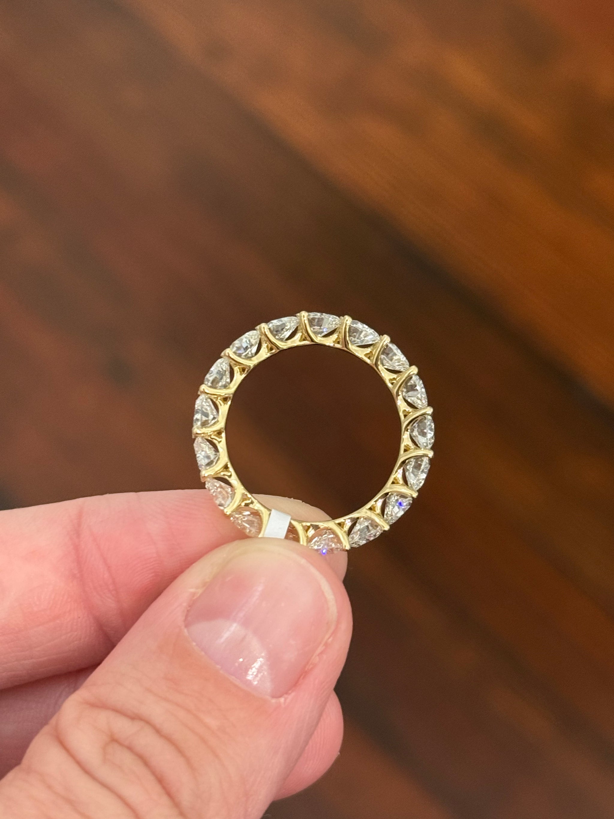 Yellow gold 4.49ct heart shaped lab diamond eternity band
