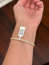 Yellow gold bezel set 10.07ct emerald cut lab diamond bracelet