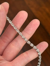 White gold half bezel set 9.74ct lab diamond bracelet