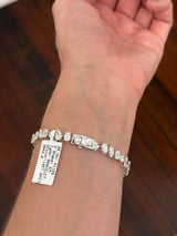 White gold mixed shape bracelet with 15.57cts of pear shape, oval, marquise, emerald cut and round lab diamonds
