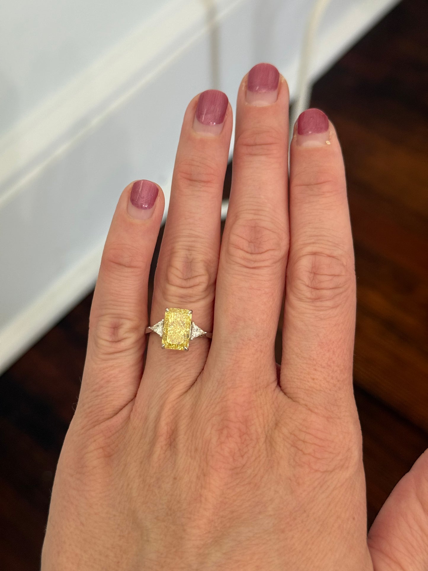 White gold radiant yellow lab diamond and trillion cut white lab diamond ring