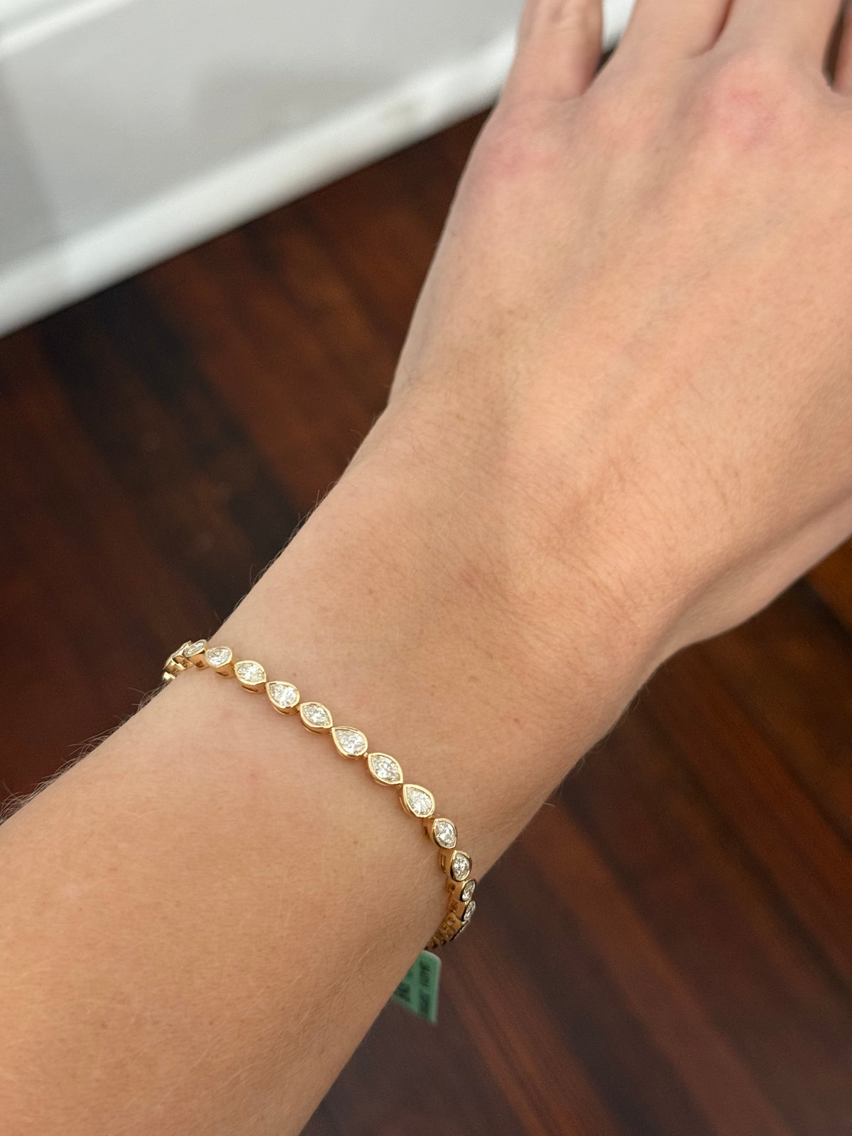 Yellow gold bezel set 3.88ct marquise and pear shape natural diamond bracelet