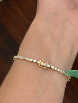 Yellow gold east west set 6.88ct emerald cut natural diamond bracelet